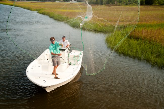 boating lifestyle, throwing a cast net.